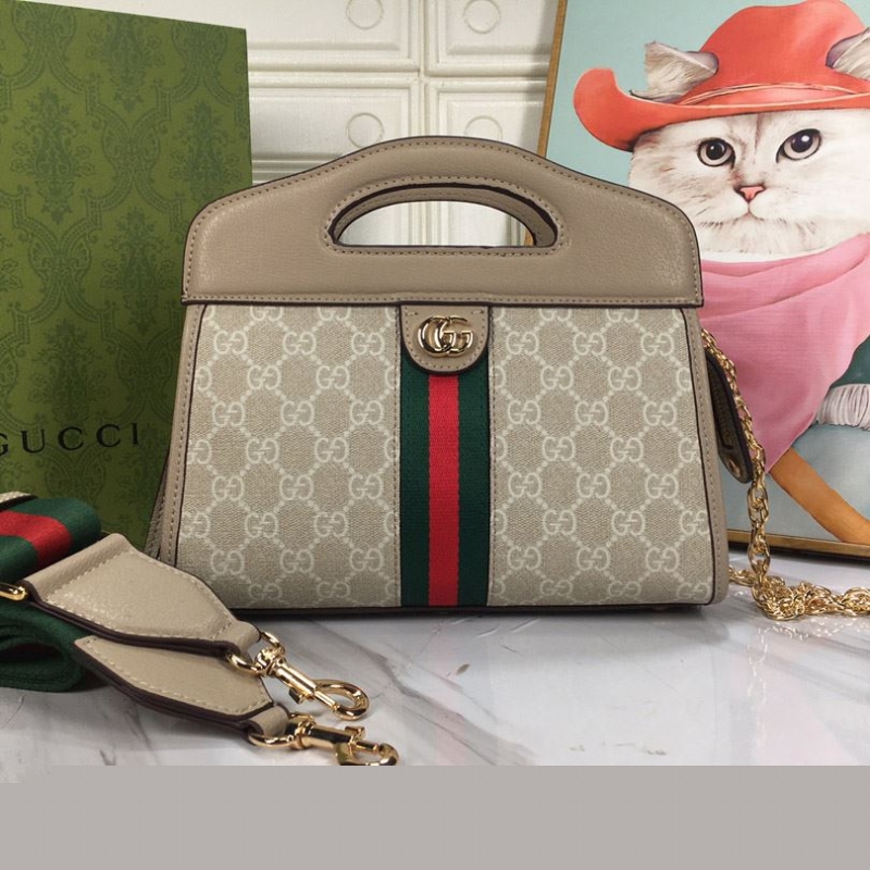 G*u*i top handle bags